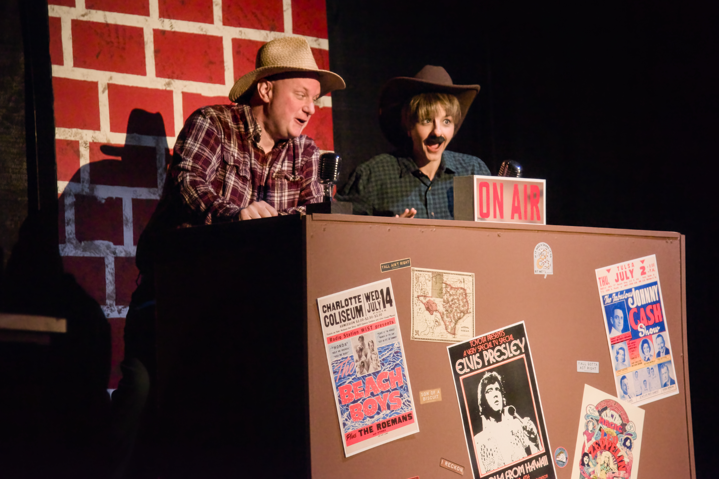 The OKKK radio on air personalities--Thurston Wheelis (Mike Blanchard) and Arles Struvie (Leah Cribb).