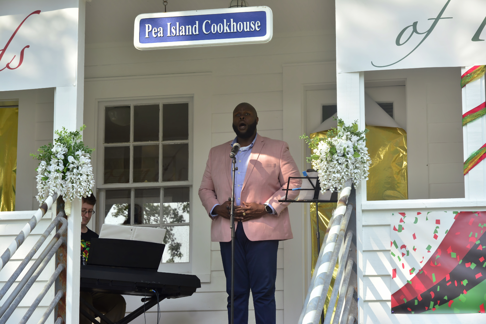 Tshombie Selby performing at Juneteenth celebration at the Pea Island Cookhouse Museum, Manteo